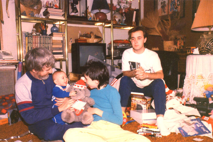 This Is A 1987 Christmas Morning Aftermath With Me, My 6-Month-Old Son Nathan, My 12-Year-Old Son Justin And My 17-Year-Old Stepson Damond. Damond Looks Thrilled With His Present Of A New Heater/Fan