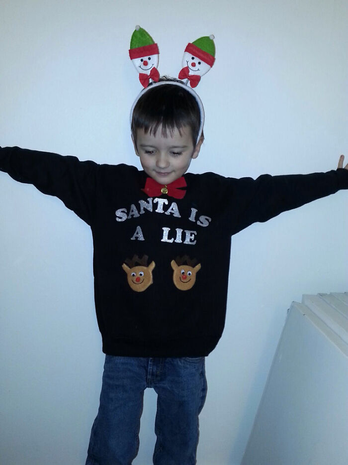 He Can’t Quite Read Yet. They Told Him It Says 'Merry Christmas'