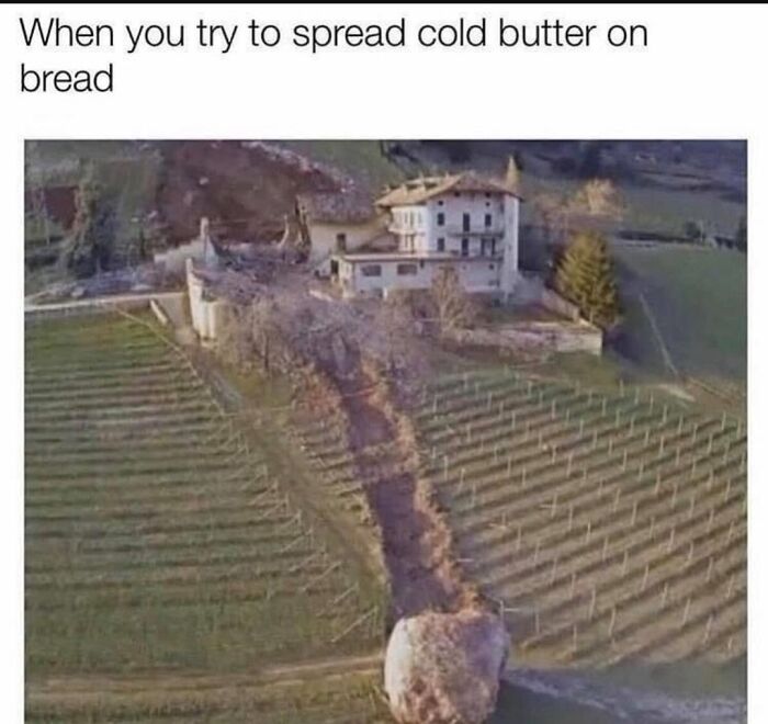 Large rock stuck on a hillside near a house, illustrating a humorous challenge in Ireland’s unique landscape.