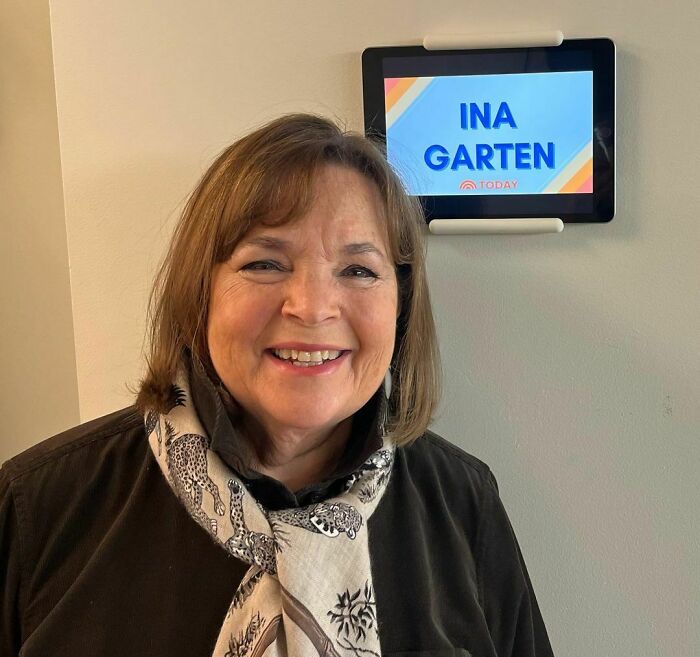 Smiling celebrity Ina Garten wearing a patterned scarf, featured among the smartest celebrities known for their intelligence.