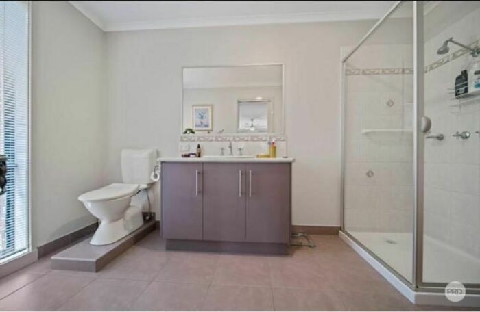 The Saddest Little Bathroom With A Potty On A Platform. What Possible Reason Is There For This