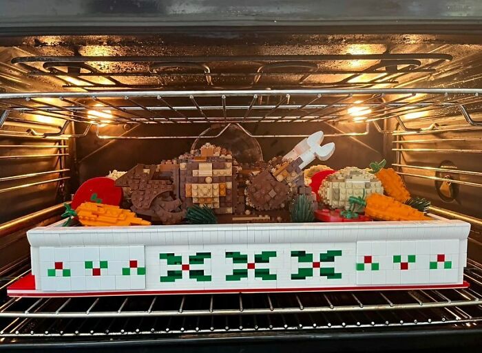 LEGO builds resembling a roast dinner with carrots and vegetables inside an oven, showcasing incredible LEGO art.