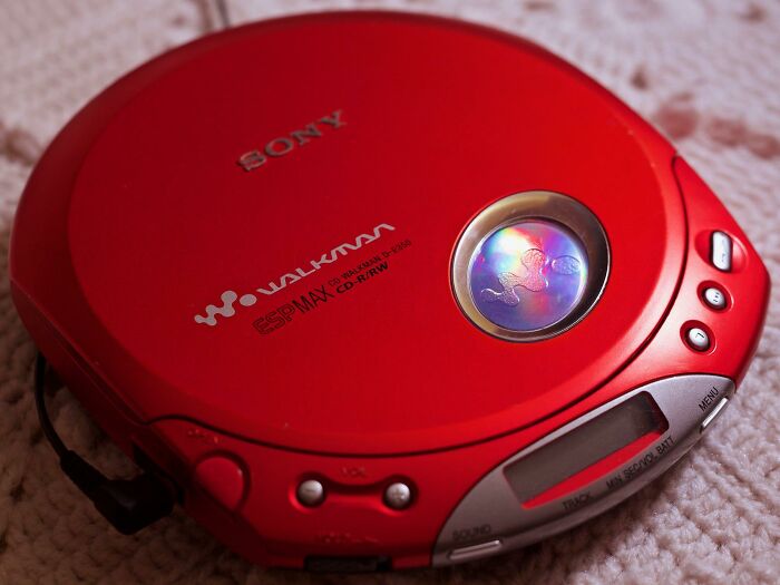 Red Sony Walkman portable CD player, a nostalgic Gen X music device from the late 1990s and early 2000s.