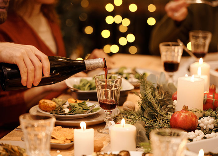 Woman Brings 5 Bottles Of Wine To Sister-In-Law's Christmas Dinner, Is Charged Additional $50 For Food Woman Brings 5 Bottles Of Wine To Sister-In-Law's Christmas Dinner, Is Charged Additional $50 For Food