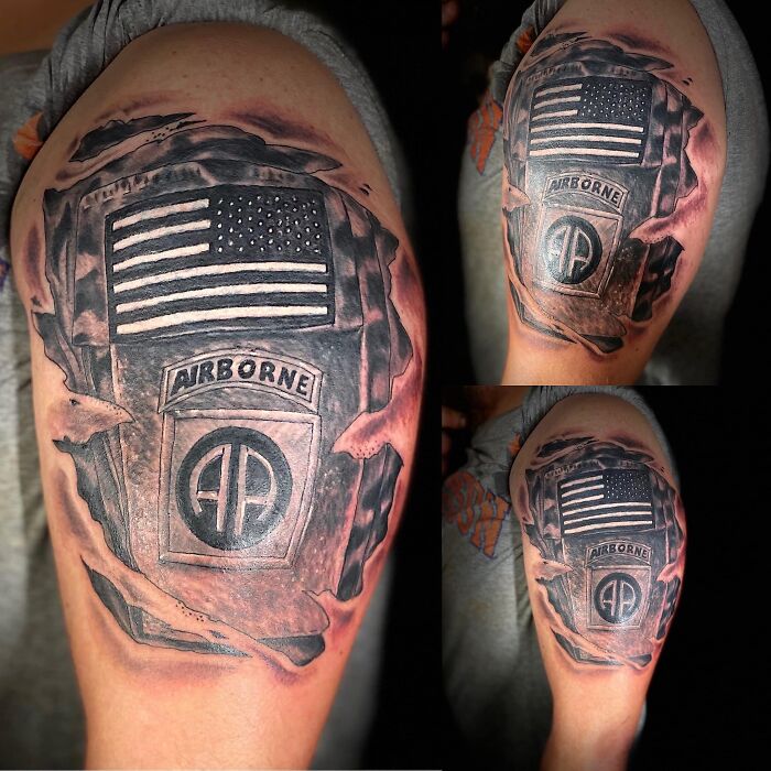 Bad tattoo with a distorted American flag and "Airborne" insignia, showcasing awkward design choices.