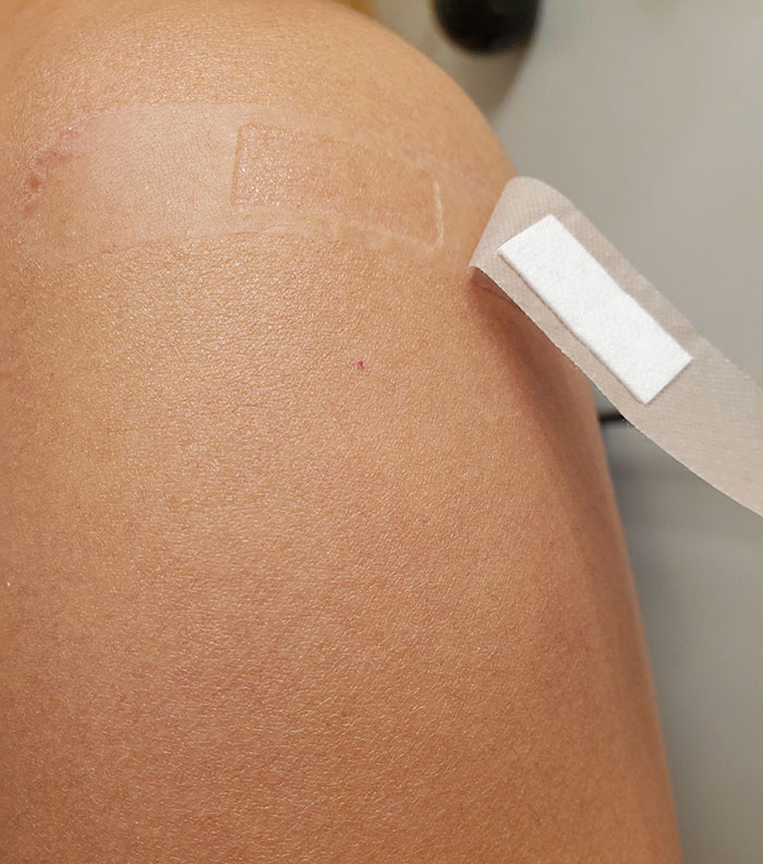 The Person Who Gave Me The Booster Shot Put The Bandage In The Wrong Spot
