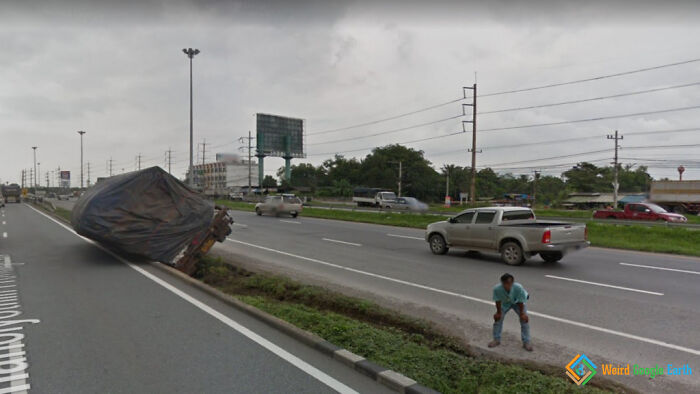 "A Meme Guy And Tipped Truck". Location: Bangkok, Thailand