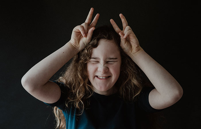 Person playing charades