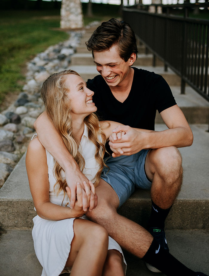 Couple sitting and hugging