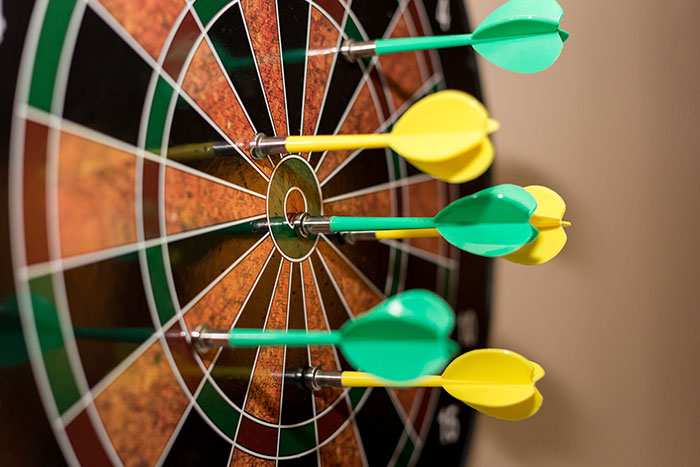 Darts board with darts