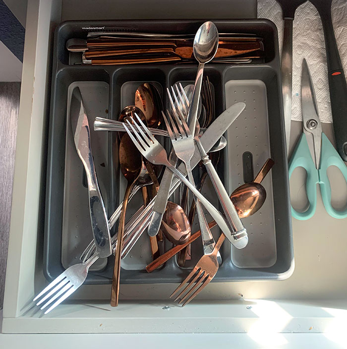 My Husband's Attempt To Put The Silverware Away