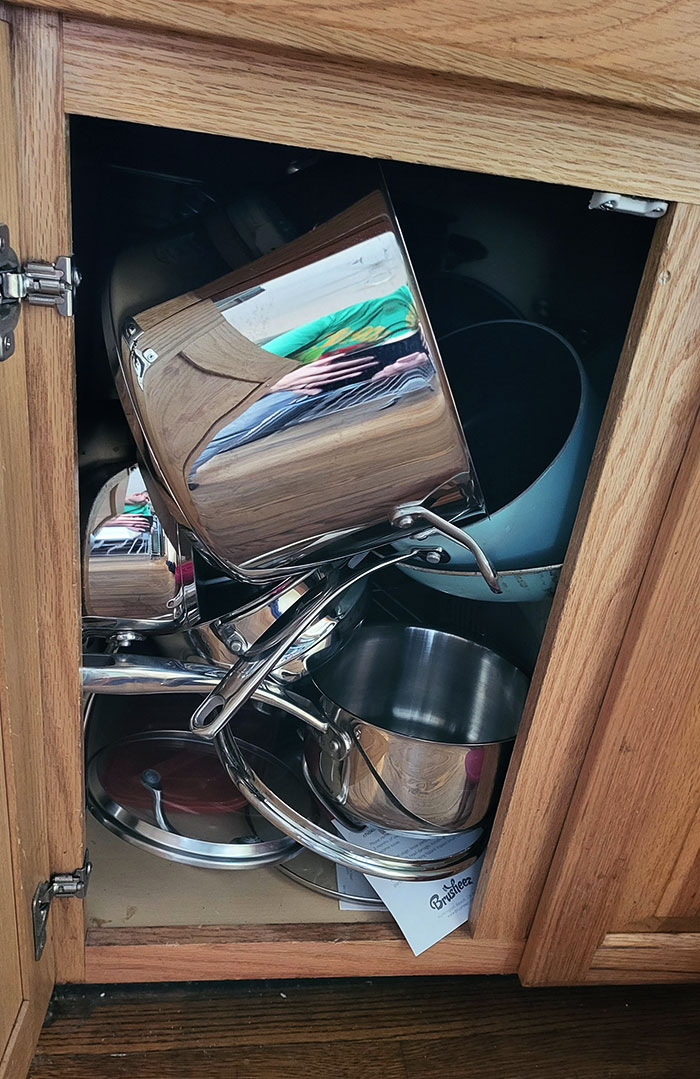 My Wife Puts Away The Pots And Pans Like This