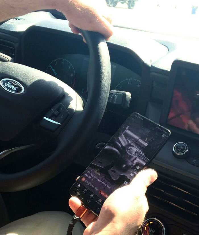 My Dad Is Watching Videos While Driving. Then He Yells At My Mother For Looking Up A Number For Work (He Doesn't Even Have A Job)