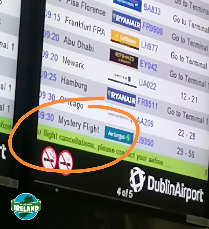 Flight departure board at Dublin Airport showing a Mystery Flight with Aer Lingus, highlighting unique Ireland travel experiences.