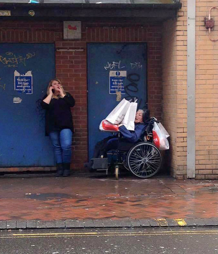 Support Worker Leaves Her Shopping Bags On Top Of The Disabled Man In Her Care As She Takes A Fag Break