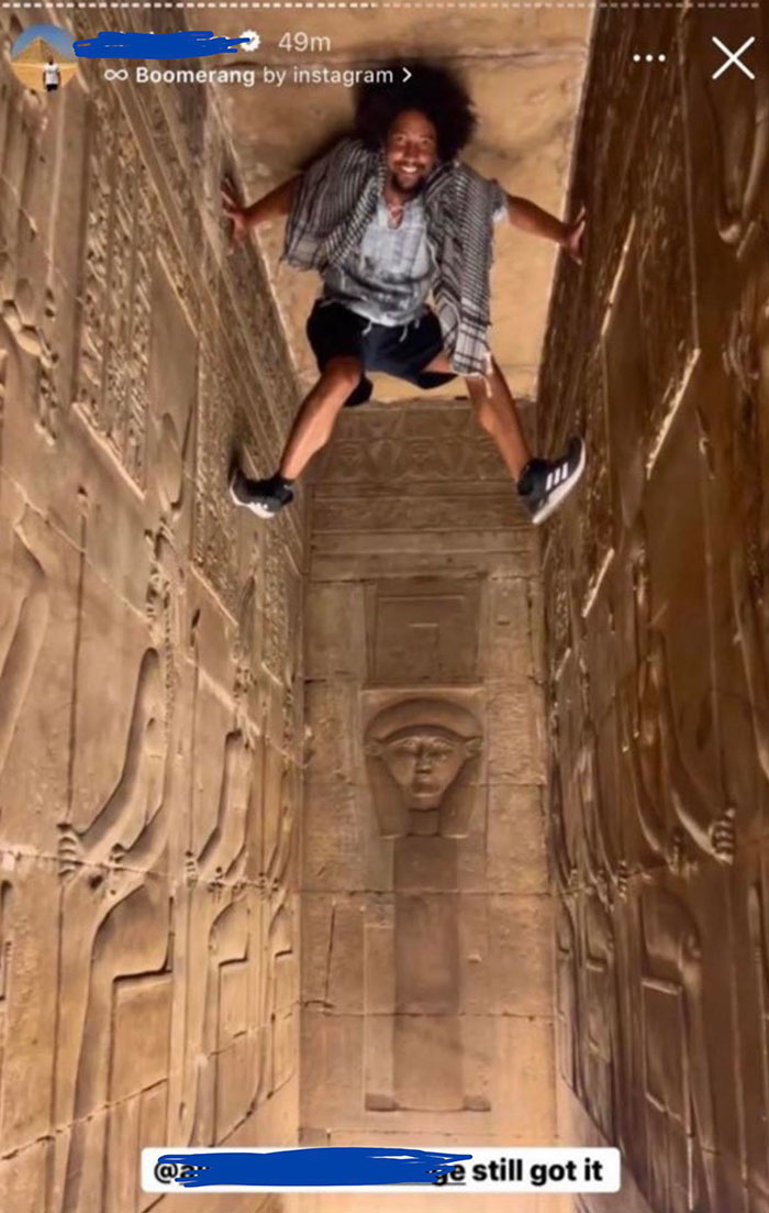 Tourist Scales Ancient Egyptian Antiquities