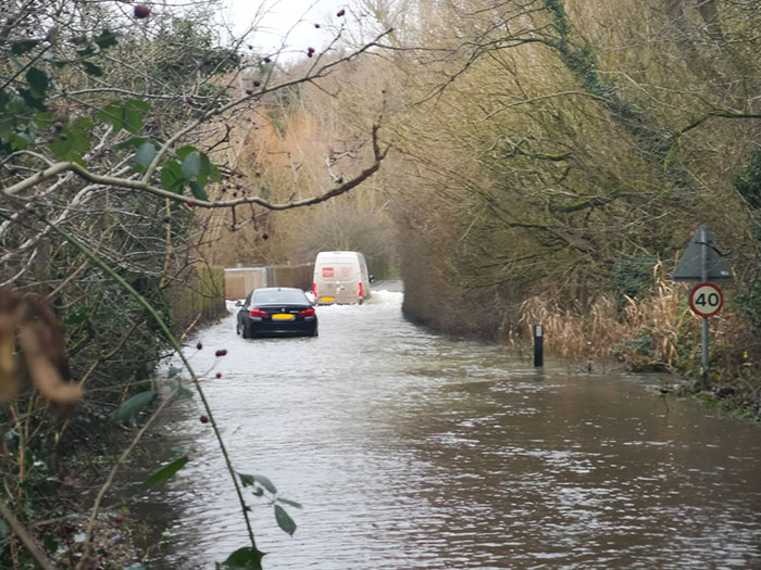 This Moring, I Walked Down To The Flooded Road In My Village To Warn People About The Flood. I Told The BMW Driver He Wouldn't Get Through, But He Didn't listen