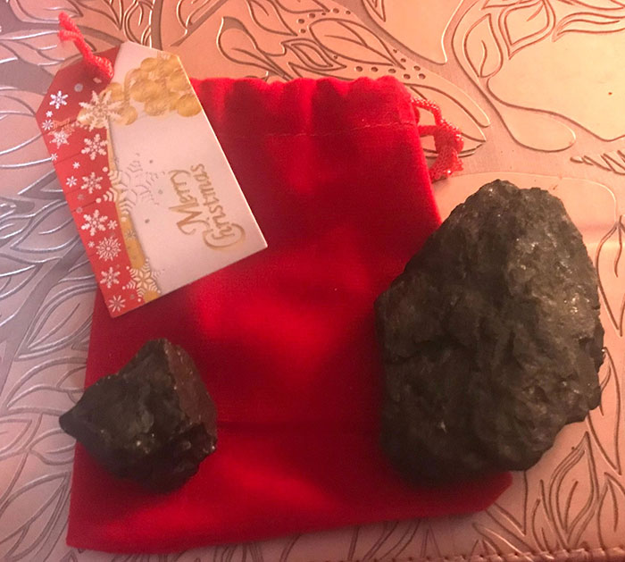 Person Goes To Celebrate Christmas With Fianc&eacute;'s Family For The First Time, Loses It After Getting 18 Pieces Of Coal As Gifts