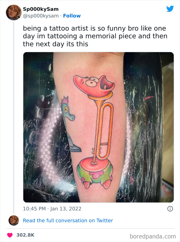 Funny tattoo of cartoon character Patrick playing a trombone on an arm.