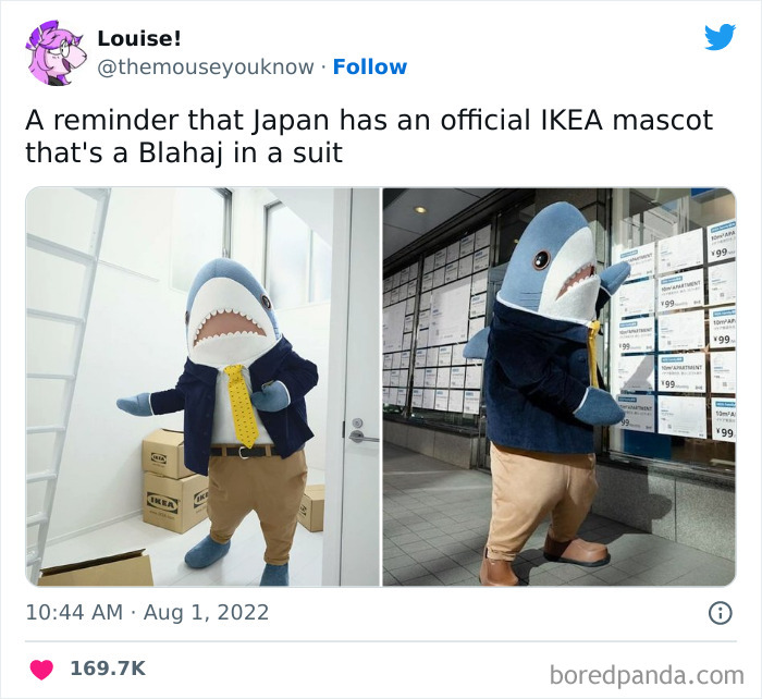 Blahaj shark mascot wearing a suit, representing the quirky side of Japan’s unique culture and lifestyle trends.