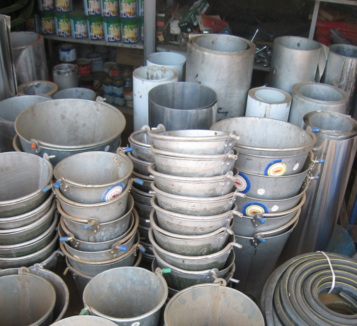 Man Is Fed Up With Coworker Kicking The Bucket He Sits On Out From Under His Butt, Fills It With Nuts And Bolts, Cuts The Bottom Off, And Observes The Chaos