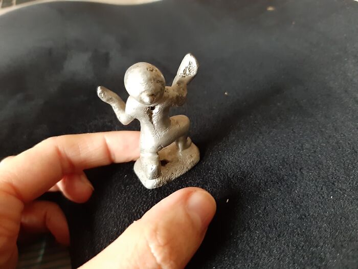 Small Faceless Metal Figurine (Photo From The Back). Seems To Be Praying. Found In A Barn Many Years Ago