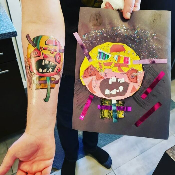 Beautiful tattoo idea executed perfectly, colorful cartoon face tattooed on arm next to child's drawing.