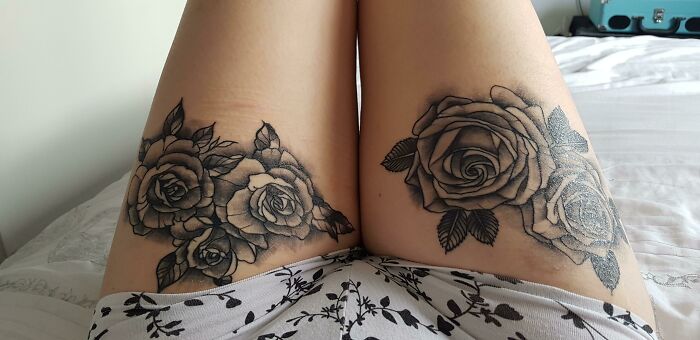 Beautiful floral thigh tattoos executed perfectly, showcasing exquisite rose designs.