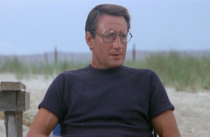 Martin Brody wearing dark blue t-shirt 