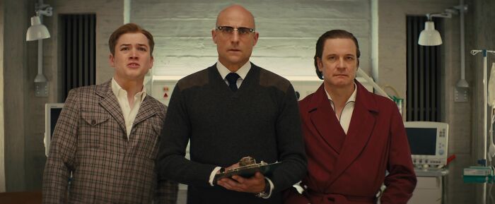 Merlin, Harry and Gary looking at something 