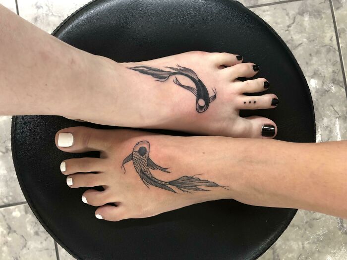 Brother and sister tattoo idea featuring matching koi fish designs on feet, symbolizing kinship and balance.