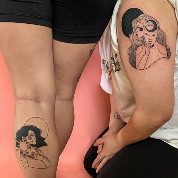 Matching brother and sister tattoos on arms, featuring complementary designs symbolizing unity and connection.