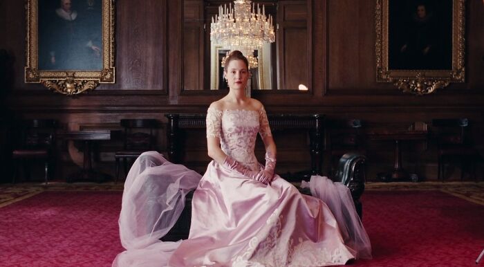 Alma wearing pink dress 