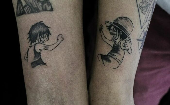 Brother and sister tattoo idea with characters facing each other on arms, illustrating sibling connection.