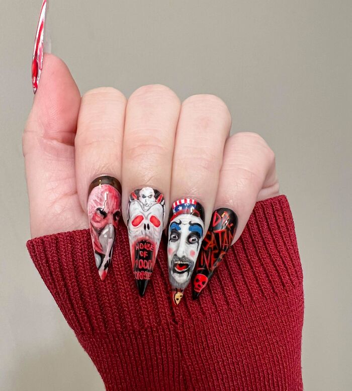 Unique nail art designs featuring vivid horror-themed characters on long acrylic nails.
