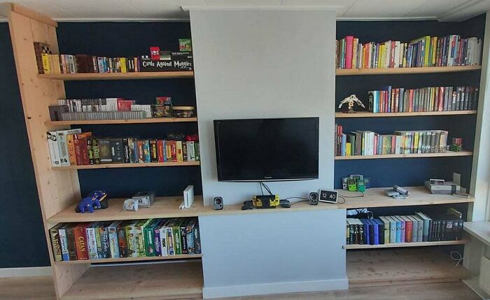 tv hanging on the wall 