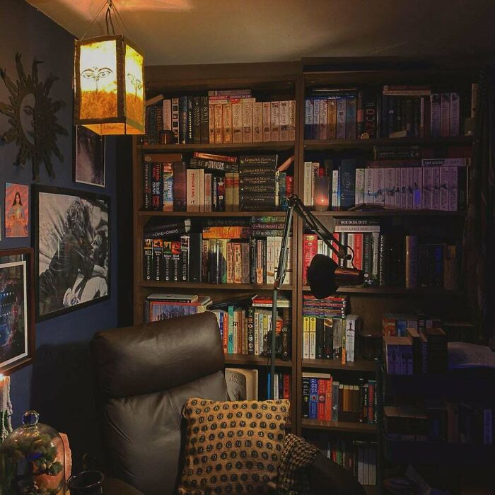 brown chair with pillow on it 