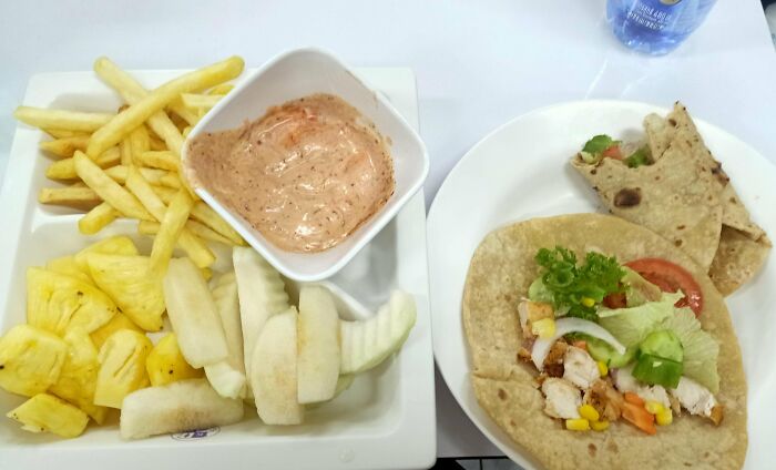 Plate with tortillas, fries and fruits