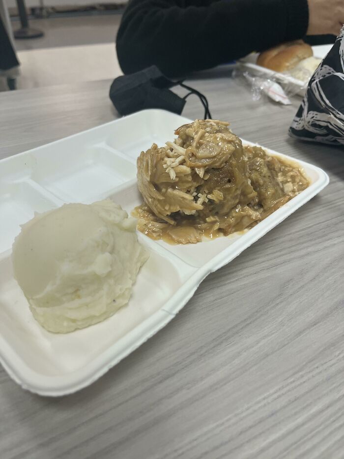 Plate with mash potatoes and meat with rice