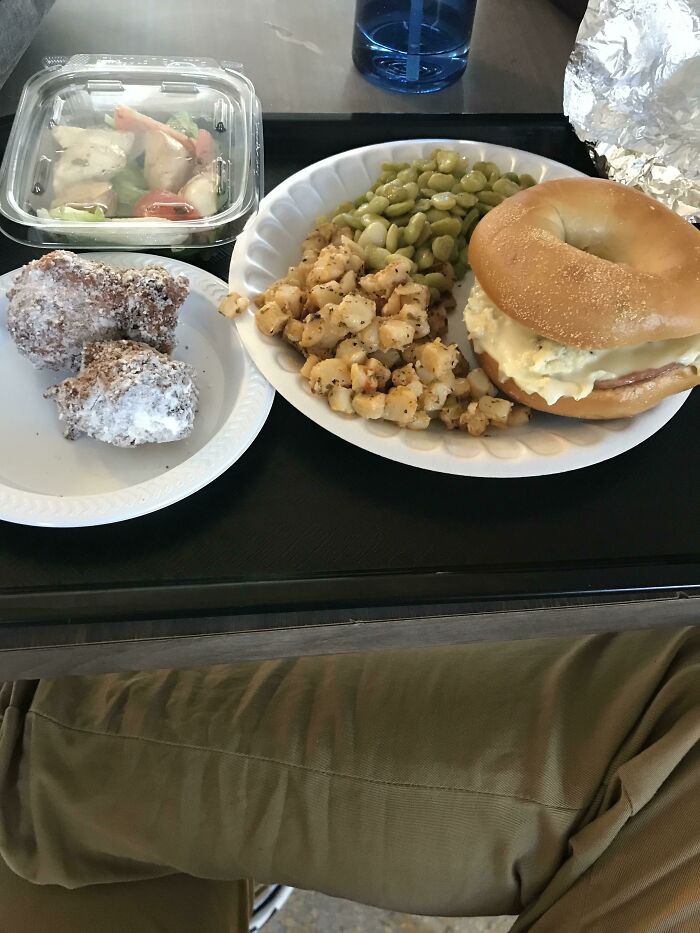 Plate with chicken, vegetables, bread