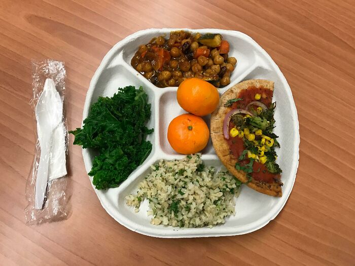 Plate with rice, vegetables and fruit
