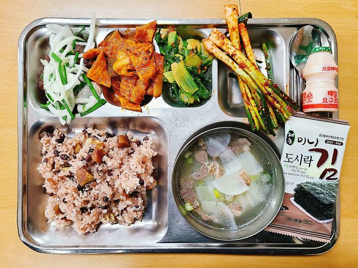 Plate with rice, kimchi, soup and vegetables