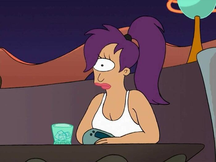 Purple-haired female cartoon character seated at a table, showcasing strength and fame attributes.