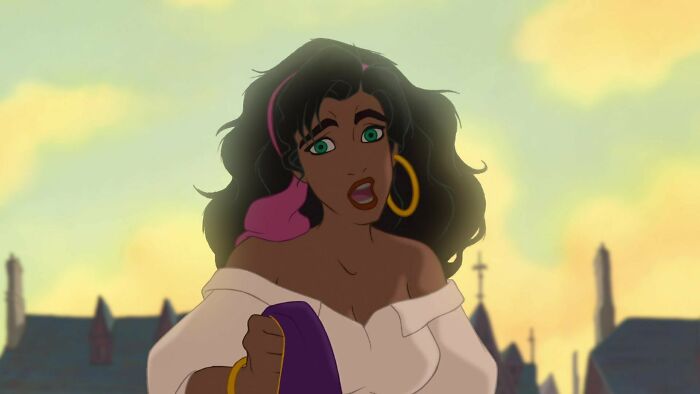 Female cartoon character with dark hair, wearing a white top and large earrings against a cityscape background.
