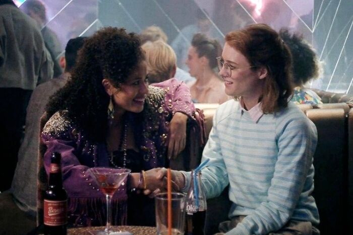 Yorkie And Kelly holding hands 