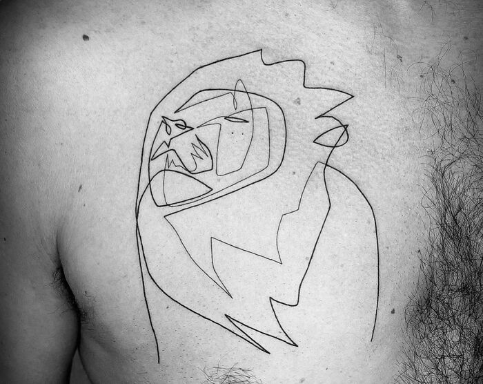 Single-line tattoo of an abstract lion design on a person's back, showcasing fine-line perfection.