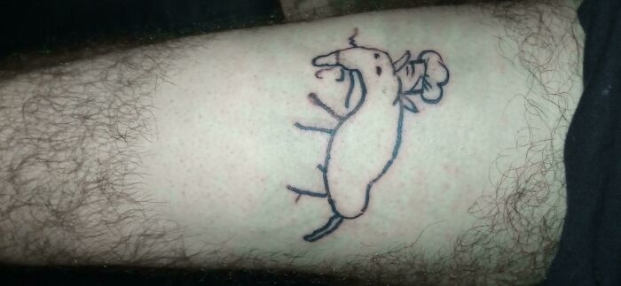Funny rat tattoo on a person's leg, showcasing a playful design to tickle your fancy.