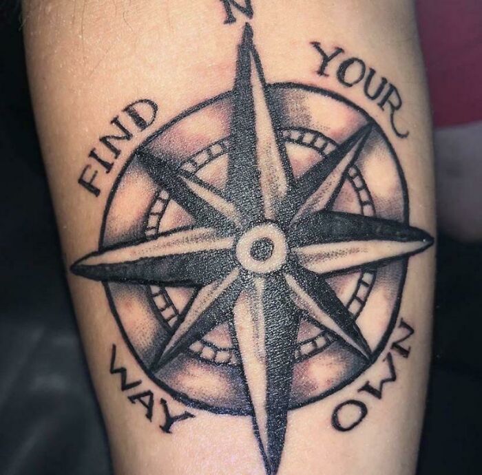 Compass tattoo with the words "Find Your Own Way."