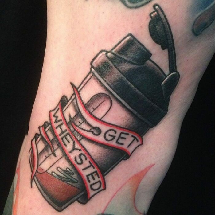 Funny tattoo of a shaker bottle with text "Get WHEYSTED," designed to put a smile on your face.