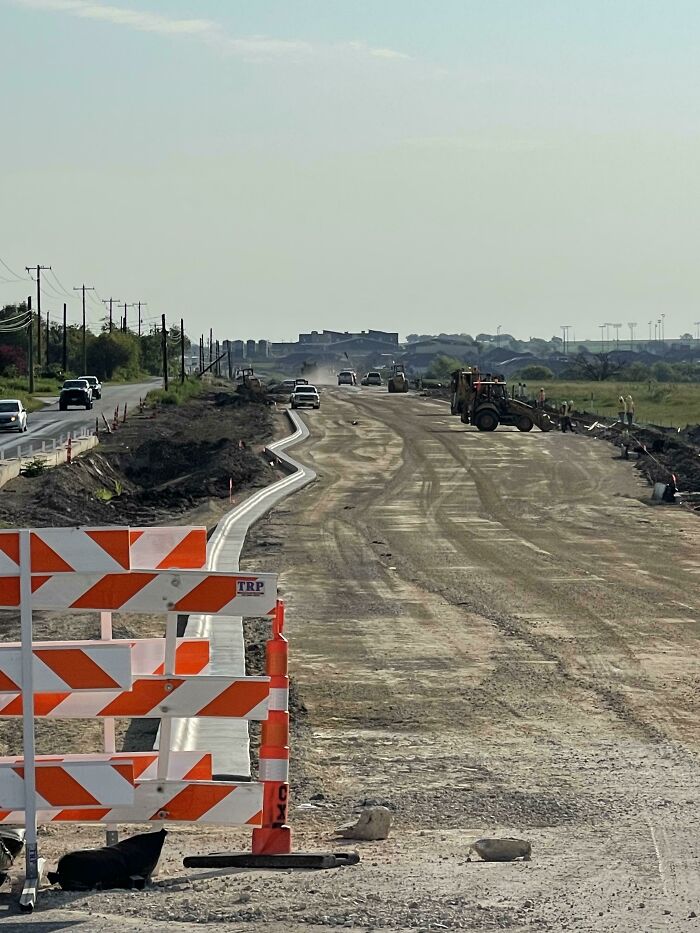 The Curb On This Straight Road Being Built